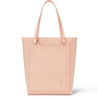 Never Still Vertical i läder och canvas TrageBags