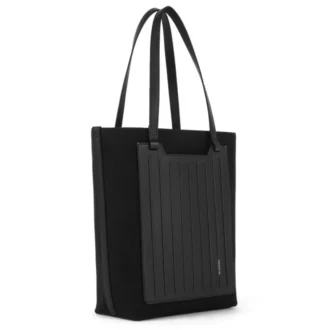 Never Still Vertical i läder och canvas TrageBags