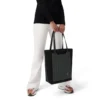 Never Still Vertical i läder och canvas TrageBags
