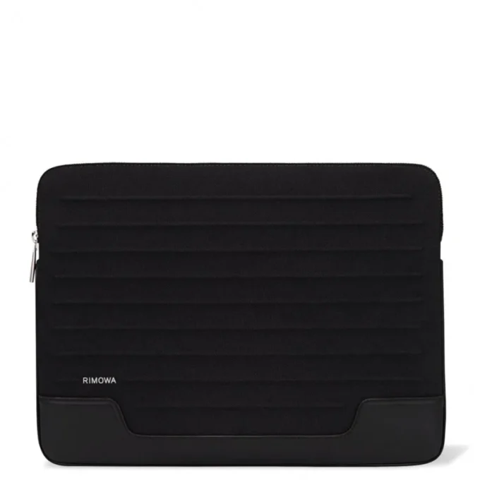 Platt laptopfodral i läder och canvas Hinkväska Platt laptopfodral i läder och canvas Hinkväska